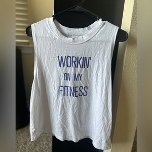 Muscle Tee with “ working in on my fitness “